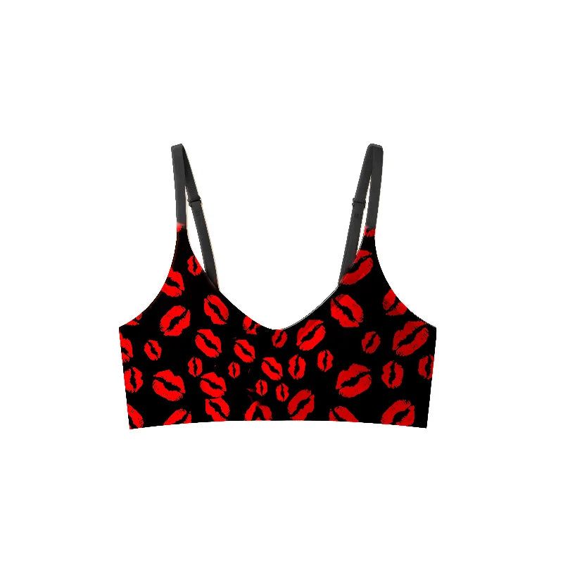 Brassière noire avec motifs lèvres roses, maintien naturel et effet seconde peau confortable.