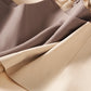 Gros plan sur les différentes teintes de la brassière confort absolu, incluant le Gris-Violet et le Beige, montrant la douceur du tissu microfibre sans coutures.